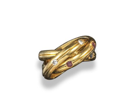A ruby, sapphire and diamond set gold triple ring by Cartier, each of the three interlocking gold yellow gold rings set with 