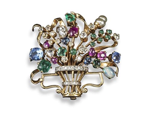 A gem-set giardinetto brooch, set overall with diamonds, sapphires, emeralds, rubies, an opal and a pearl in gold. Circa 1950