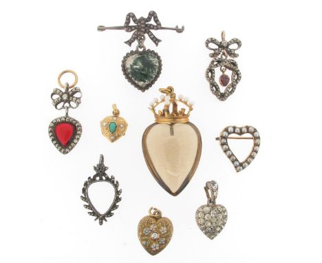 Nine heart-shaped pendants, including a gold heart-shaped pendant, set with a diamond and foliate enamel decoration. A smoky 