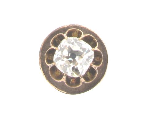 A diamond solitaire stud, the old cushion-shaped diamond is set in gold.