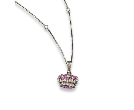 A 19th century ruby and diamond crown pendant, set with rose-cut diamonds and old cushion-shaped rubies in silver and gold. O