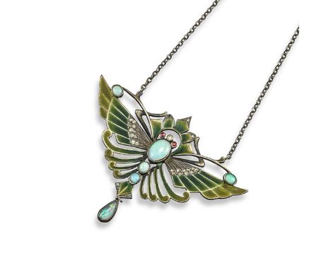 A Jugendstil plique-à-jour silver pendant, designed as a stylised butterfly with shaded green and yellow enamel wings, set wi