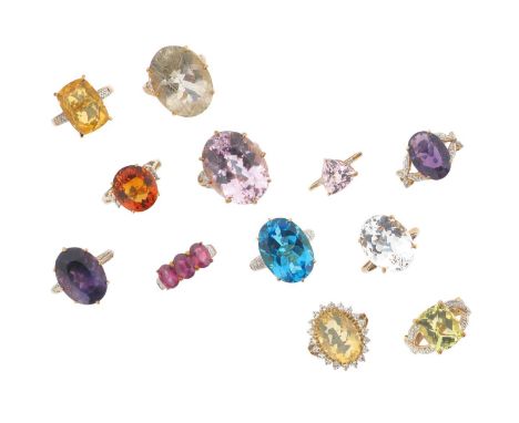 Twelve gem-set gold rings, including a 9ct gold blue topaz ring, two 9ct gold fire opal rings, two 9ct gold amethyst rings, a