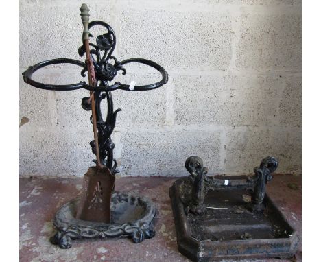 A Regency cast iron boot scraper with rectangular dished base, together with a Victorian cast iron stick stand 