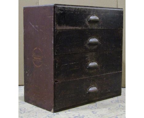 Vintage wooden haberdashery chest of four long drawers, with centralised gadrooned cup handles, transfer printed 'Liberty lan