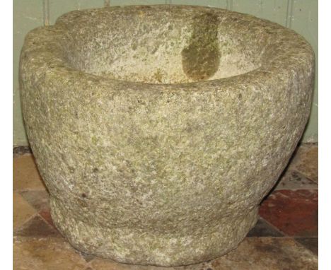 A early carved granite mortar (later adapted to a planter with drilled drainage hole) approx 43cm diameter x 30cm high 