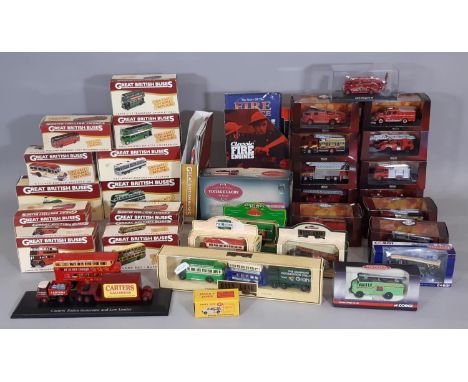 Collection of model vehicles including 11 boxed fire engines and 11 1:76 scale die cast model buses all by Atlas, together wi