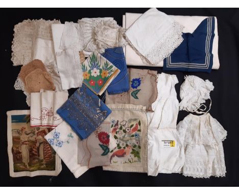 Collection of vintage household linen including baby gowns and baby bonnet, table mats and cloths- many with lace edging and 