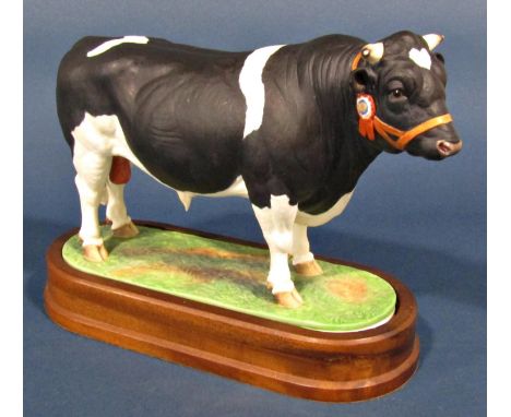 A Royal Worcester porcelain model of Holstein-Friesian bull, modelled by Doris Linda 36/500, with certificate and timber base