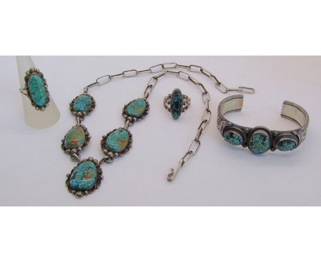 Group of Navajo Native American sterling silver jewellery set with turquoise, comprising a pendant necklace and matching ring