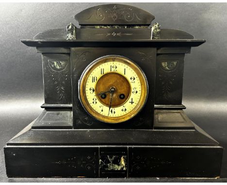 A Victorian black slate and marble mantle clock of architectural form enclosing an eight day striking movement, together with