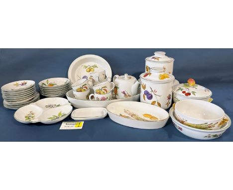 A collection Royal Worcester 'Evesham' 'Worcester Herbs' pattern dinner and tea wares comprising various lidded storage jars,