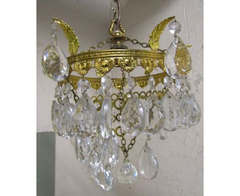 A small gilt metal banded bag type hanging ceiling light with single bulb fitting and faceted tear drops, 30 cm drop approxim