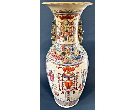 Large Chinese Famille Rose vase with decorative panels depicting characters dancing and playing musical instruments, with rai