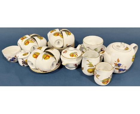 A collection of Worcester Evesham pattern china wares comprising tea pot, thirteen cups and saucers, two milk jugs, covered s