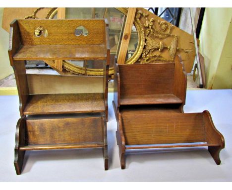 A collection of seven small vintage book troughs, principally in oak, together with a set of Wedo circular library steps 