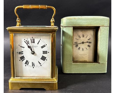 A brass carriage clock with square enamelled dial retailed by Mappin &amp; Webb, together with a further carriage clock with 