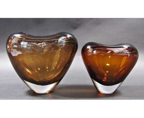 Two amber glass heart shaped vases by Lutken Holmegaard. 16cm and 14cm tall. 