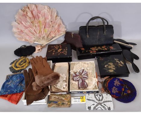A collection of Ladies vintage dressing accessories including beaded evening bags, a French silk leaf fan, a black painted la