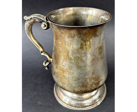 A George III silver Tankard with scrolled handle, London 1769 makers mark William Turton,13.5 cm in height and 13.5 oz approx