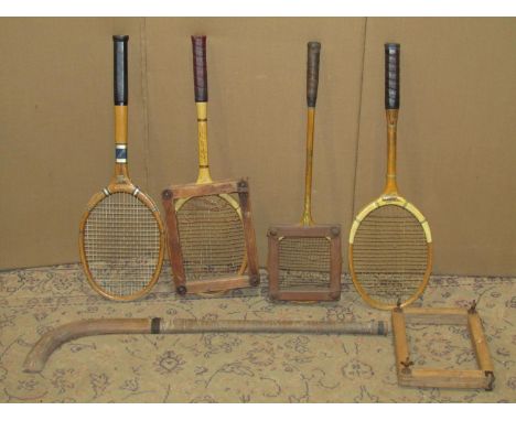 Three vintage tennis rackets, further squash racket, and hockey stick (5) 