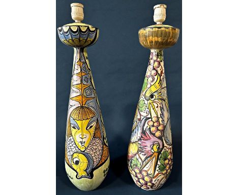 A vintage matched pair of large vase shaped studio pottery table lamps with all over hand painted abstract decoration of bird