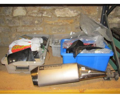 A Suzuki GSXR titanium exhaust back box together with further motorcycle related parts 