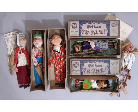 Collection of vintage puppets comprising a boxed Pelham Pirate , boxed Pelham girl with larger head and green felt skirt, and