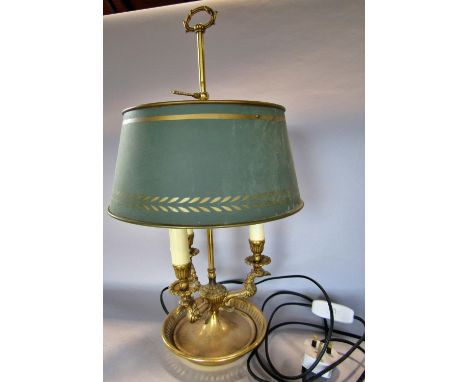 A gilt bouillotte lamp with three avian neck branches and a green tole ware shade, 56cm high approx. 