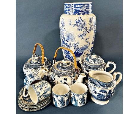 A collection of oriental porcelain items to include: Japanese blue and white porcelain vase with crane and flower decorations