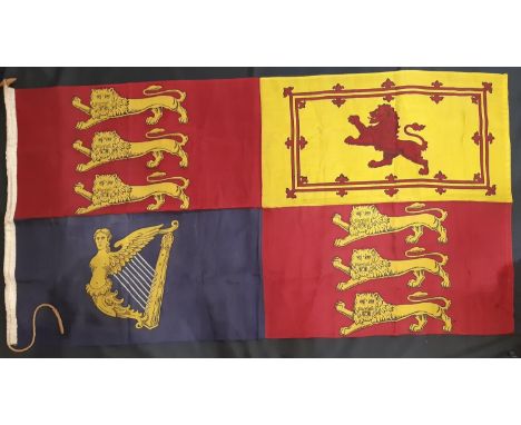 Large vintage Royal Standard flag, the 4 quadrants depicting the coat of arms of the British nations with rope and wooden tog