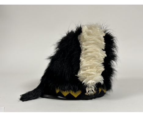 A Royal Scots Dragoon Guards popes feather bonnet. white, yellow and blue chevron, head barrel white hackle and bi-metal or R
