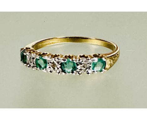 A 9ct gold four stone emerald and three stone diamond set ring the emeralds approximately 0.1ct N 1.65g&nbsp;