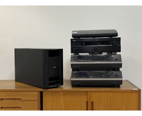 A Bose AV35 control console, together with a Bose model PS28 III powered speaker system, a Yamaha natural sound AV amplifier 