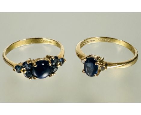 A 9ct gold oval sapphire set ring set diamond point to shoulder sapphire approximately 0.2ct N 1.77g and a 9ct gold ring set 