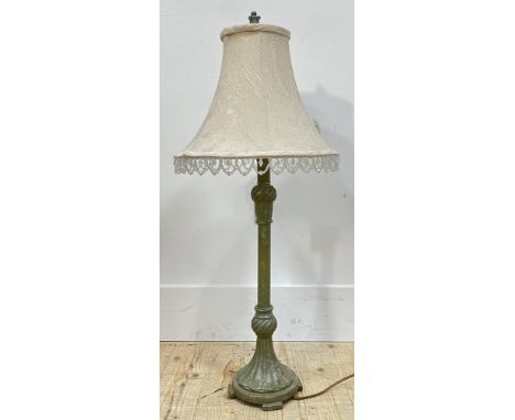 A cast metal lamp with acrylic lustre shade, the base with fluted design (height including shade- 75cm)
