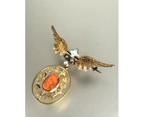 A Edwardian 15ct gold winged brooch with enamel fleur de lis set three seed pearls with engraved inscription verso IMJ March 