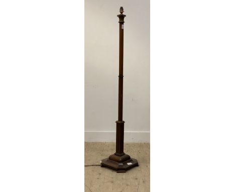 An Art Deco period mahogany lamp standard of faceted octagonal form. H156cm.&nbsp;