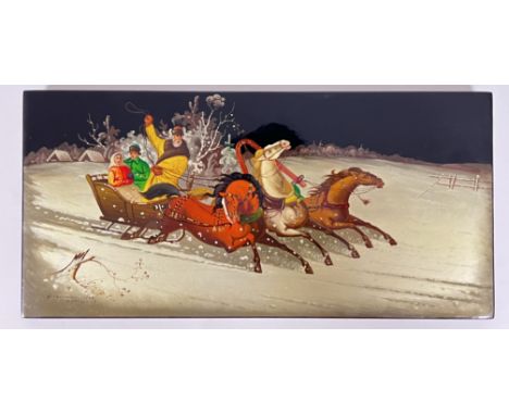A vintage Russian lacquered wall plaque decorated with figural winter scene of a horse-drawn sleigh, signed and dated lower l