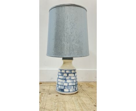 A modern Iden Pottery lamp with abstract blue and white motifs complete with pale blue linen drum shade (height excluding sha