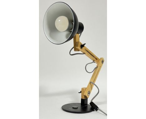 A modern Tomons angle-poise lamp (wood swing arm desk lamp)