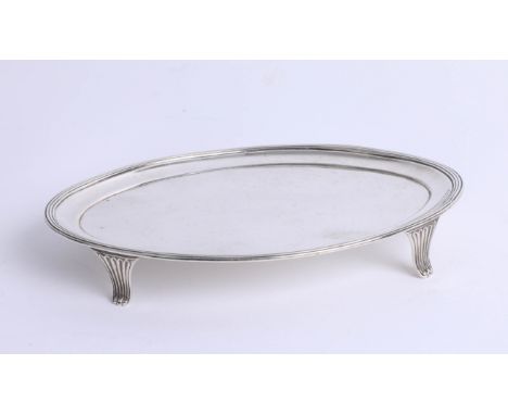 A Geo III silver waiter, maker 'C.F', London, circa 1802, the oval top on four curl legs, length 15.5cm width 11cm, 3.89oz/12