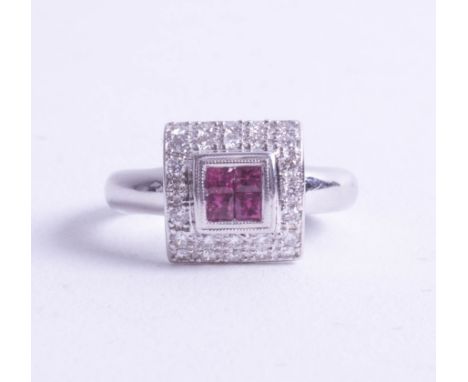 An 18ct white gold ruby and diamond ring of square design, size O.