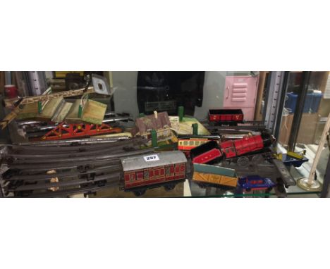 SHELF OF HORNBY TIN PLATE TOY RAILWAY WITH TRACK AND CROSSINGS
