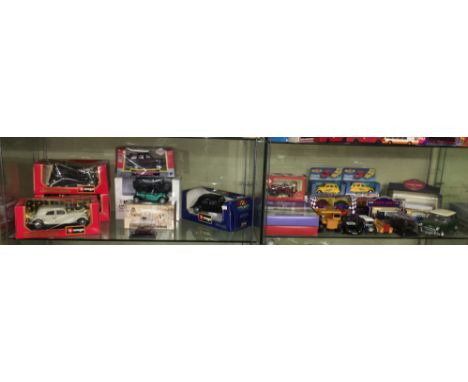 TWO SHELVES OF VARIOUS BOXED DIE CAST MODELS OF VINTAGE AND SPORTS CARS BY BURAGO, DINKY, ETC (SOME PLAY WORN)