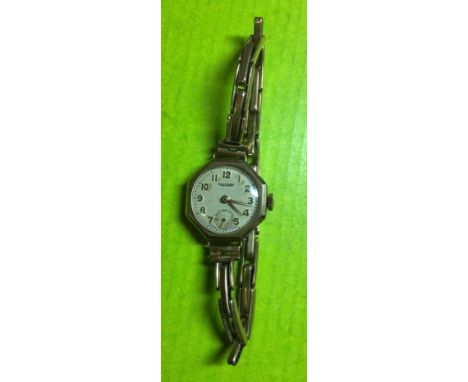LADIES 9CT OCTAGONAL GOLD CASED ROTARY WRIST WATCH ON EXPANDING BRACELET (9CT STRAP METAL CORE) 16.1G OVERALL APPROX