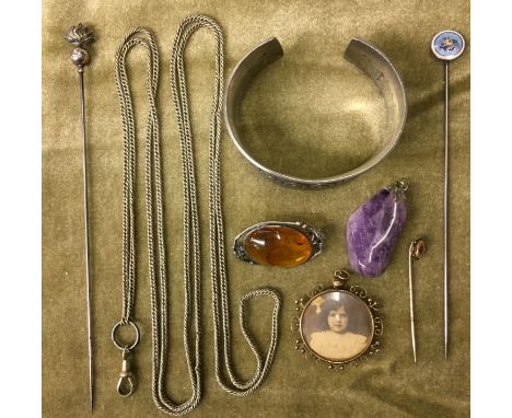 PAD OF CHARLES HORNER STERLING HAT PIN, UNMARKED RED METAL AND CABOCHON STONE STICK PIN, A SILVER AND ENAMEL HAT PIN, AMBER C