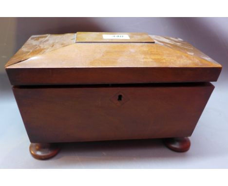 A 19th Century mahogany tea caddy, raised on bun feet. H-16cm, W-27cm, D-15cm 