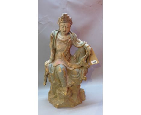 A 19th Century Chinese carved wooden statue of Guan Yin. Height is 60cm width 28cm