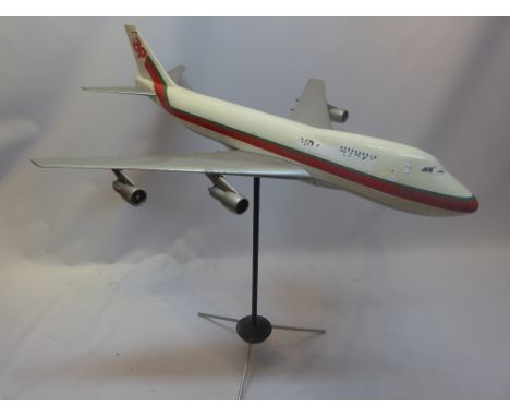 A large fibre glass model of a plane of tripod stand, H;116cm W:132cm D:113cm